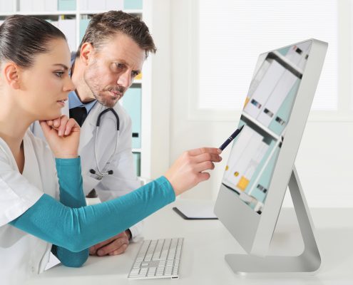 Doctors use the computer, concept of medical consulting